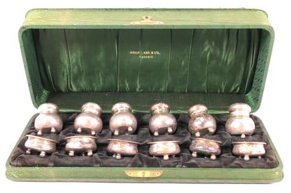 Twelve Piece Set Sterling Salt Cellars and Pepper Shakers