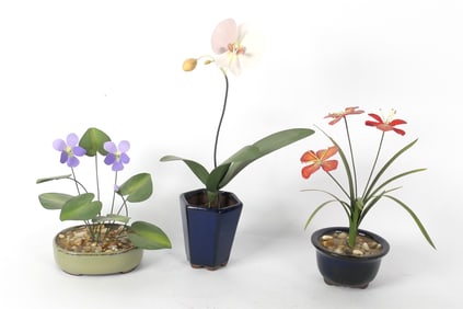 Three Metal Floral Sculptures