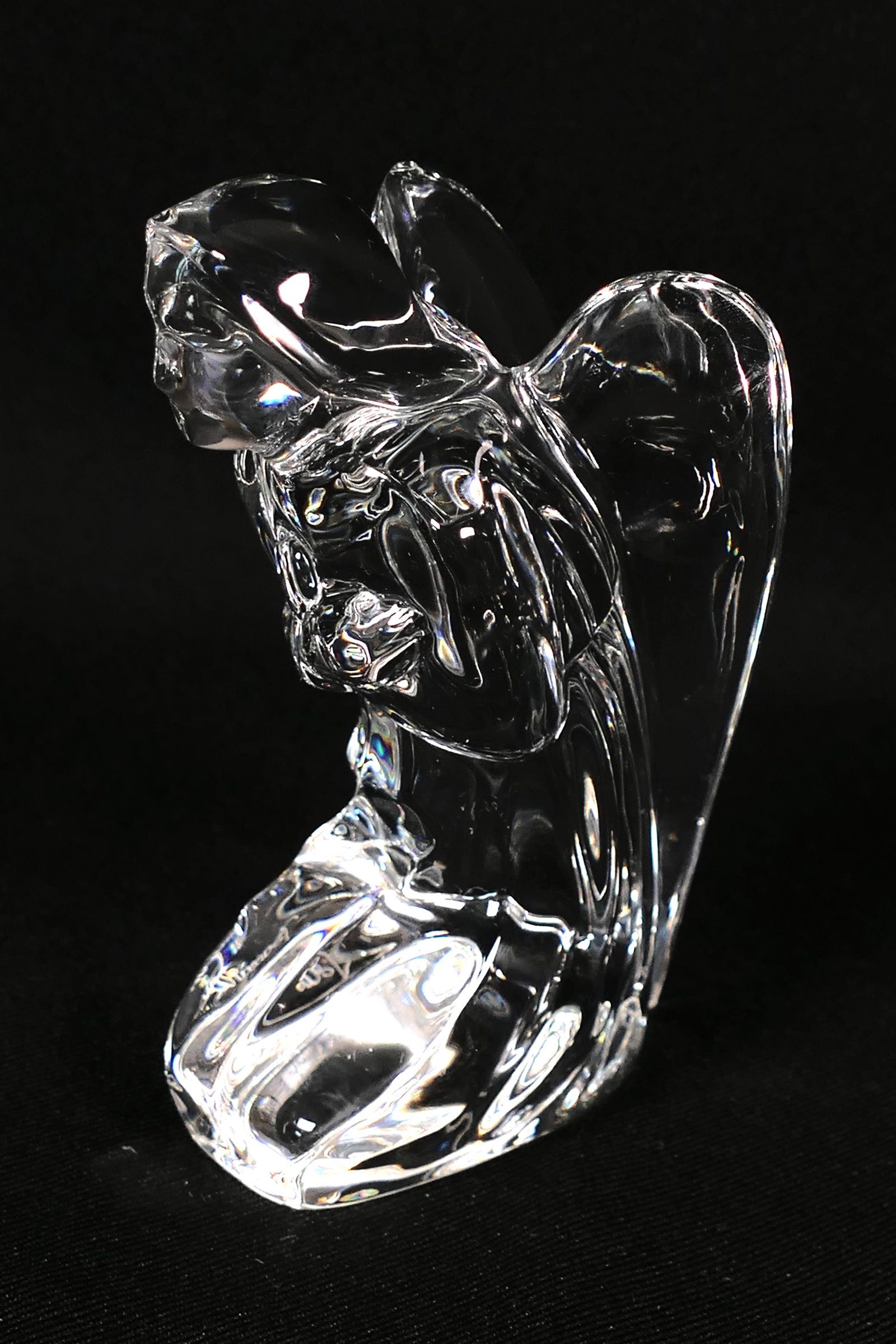 Baccarat Crystal Angel: Baccarat crystal kneeling angel. Marked with etched signature and stamp. Size: 4.5"h Location: Den