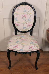 Louis XV Style Balloon Back Side Chair: Louis XV style balloon back side chair with carved pediment, finger roll trim, carved legs and skirt and floral and vine upholstery. Chips in frame. Size: 20"w x 19"d x 3'5"h Location: Dining Room