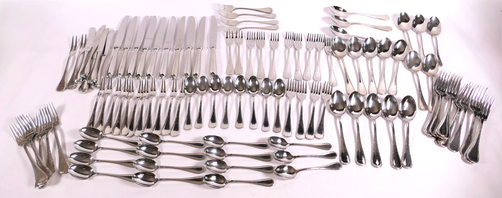 Christofle Capricorne Flatware for (Almost) 12: Cristofle Capricorne flatware for almost twelve including (12) dinner forks, (12) salad forks, (10) dinner knives, (13) tablespoons, (22) teaspoons, (11) seafood forks, (2) dinner forks. Plus (1) dinn