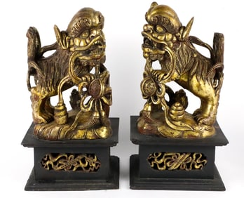 Two Carved Foo Dogs