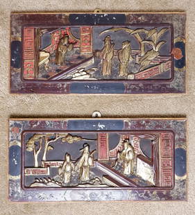 Pair of Chinese Carved Wood Panels: Pair of Chinese carved wood panels in red, black, and gold tones depicting scenes with 3 robed figures standing in gardens near pavilion entrances. Borders show wear and finish loss. Size: 17.5"w x 8.
