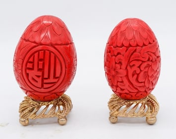 Two Carved Red Lacquer Eggs