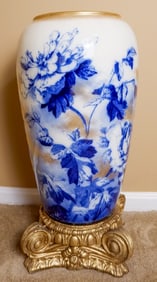 Large Blue and White Floor Vase With Gilt Accents On Ornate Gold Stand