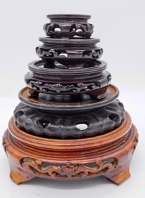 Five Carved Graduated Wooden Bases