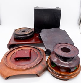 Eight Carved Wood Display Stands