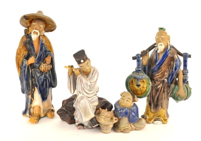 Three Mudmen Statuettes