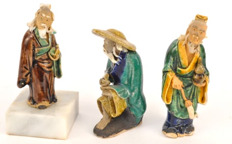 Three Mudmen Figures