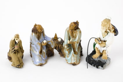 Three Mudmen Figurines