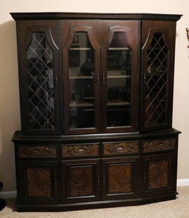 Two Piece Asian Design Breakfront: Two-piece teak modern Asian design breakfront cabinet with molded cornice, double middle doors flanked by single door with lattice fretwork. The cabinet center possesses triple stationary shelves and