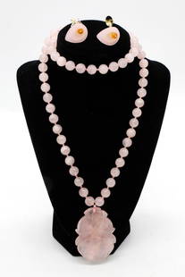 Carved Rose Quartz Necklace and Earrings: Rose quartz necklace with polished beads knotted on pink thread with carved pendant. Complementing the necklace is a pair of earrings designed as calla lilies, with pastel pink petals, green stems, an