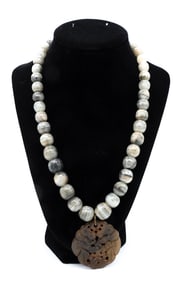 Carved Stone Pendant Necklace with Striated Beads