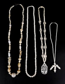 Four Carved Bone Necklaces
