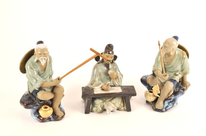 Three Mudmen Figurines