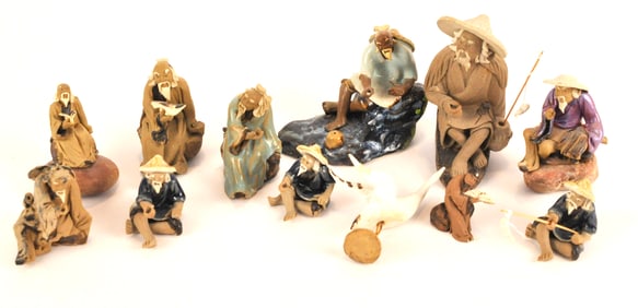 Twelve Assorted Small Mudmen