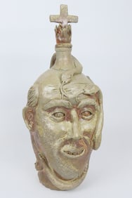 Folk Art Stoneware Man with Snakes