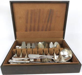 Silverplate Flatware and Serving Pieces: Silverplate flatware and serving piece assortment including brands Dolfingers, Meriden Brita Co. with some dinner knives marked J A Henkels. Plus flatware box (wear). Size: Box 14.75"w x 10.75"d x 3'H