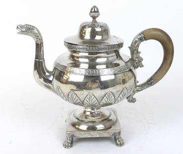 Sterling Sheffield Tea Pot: Sterling tea pot marked Sheffield 1923 with acorn finial, dragon spout on a pedestal base with wood insert handle. Repair on base. Total weight including wood handle 35.200 ozt Size: 10.5"w x 6"d x 9.