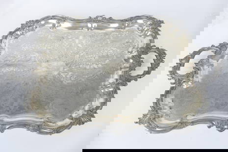 Silverplate Waiter's Tray: Large double handled silverplate waiter's tray featuring Victorian style scroll and shell designs and foliate engraving. Very heavy. Wear. Size: 32"w x 20"d