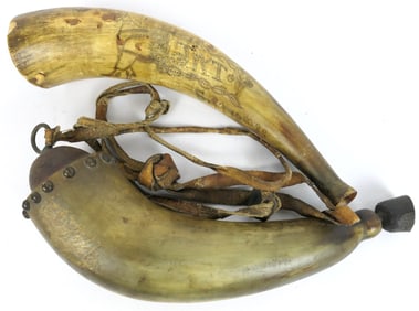 Two Carved Powder Horns