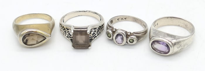 Four Sterling Rings with Stones
