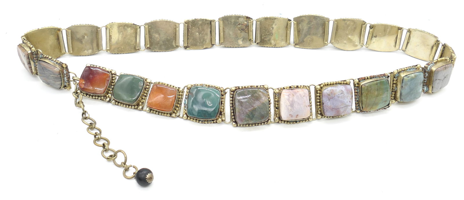 Vintage Multi Color Stone Belt: Vintage multi color stone belt in beaded frame housing with irregular shaped and surfaced stones. Size: 32.5"L