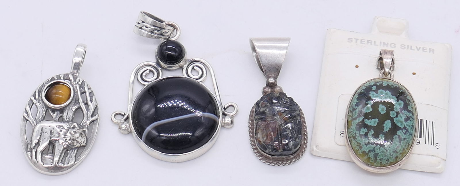 Four Sterling Pendants (1 of 3)