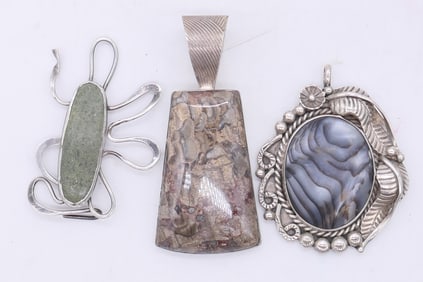 Three Sterling Pendants