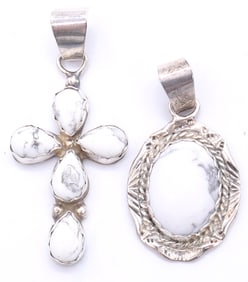 Two Navajo Sterling Moulite Pendants`
