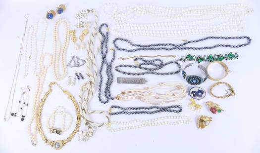 Costume Jewelry Assortment: Costume jewelry assortment including artist signed pewter Christmas tree earrings, vintage Avon faux turquoise sunburst cuff, Mary Kay and Monet necklaces and much more. Size: Largest necklace