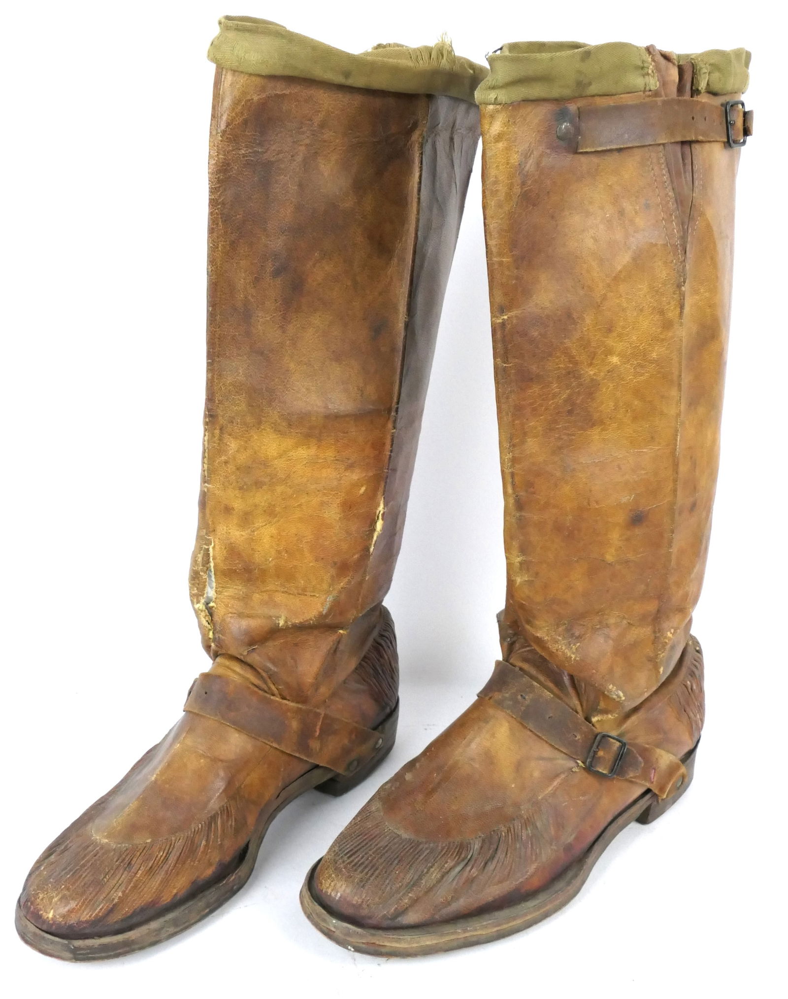 Antique Leather Snake Boots: Antique leather snake boots with pleated toes and heels and adjustable leg strap. Leather has wear by the sole and seams and missing triangle insert on shaft. Size: Unmarked but approx. men's size 13