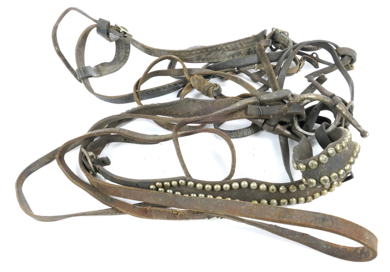 Two Bridles: Two bridles including conch and croco embossed and one studded. Rough condition.