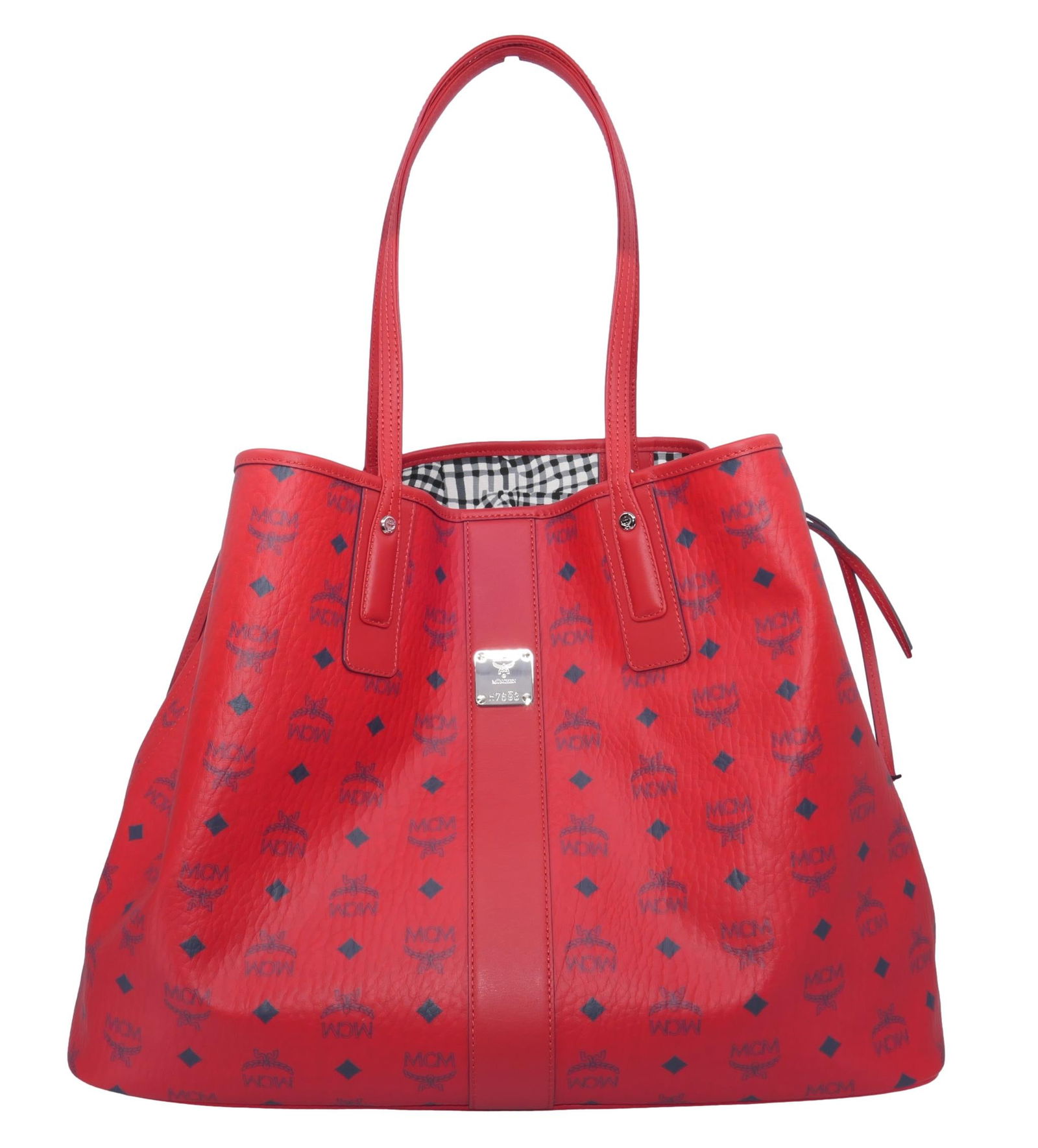 MCM Large Liz Reversible Tote: MCM large Liz Reversible Tote in ruby red and black and white coated canvas with cinch straps. Plus flat zip bag and dust cover. Size: 18"w x 8"d x 13"h