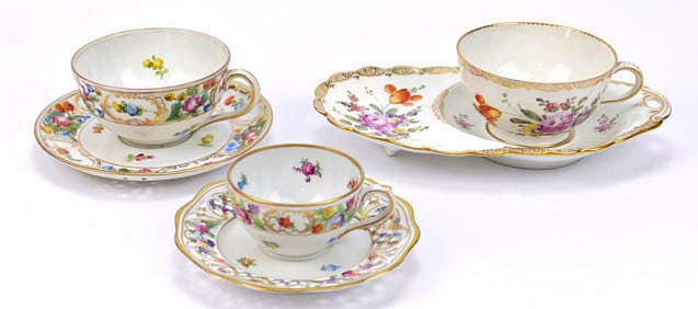 Three Floral Cups and Saucers