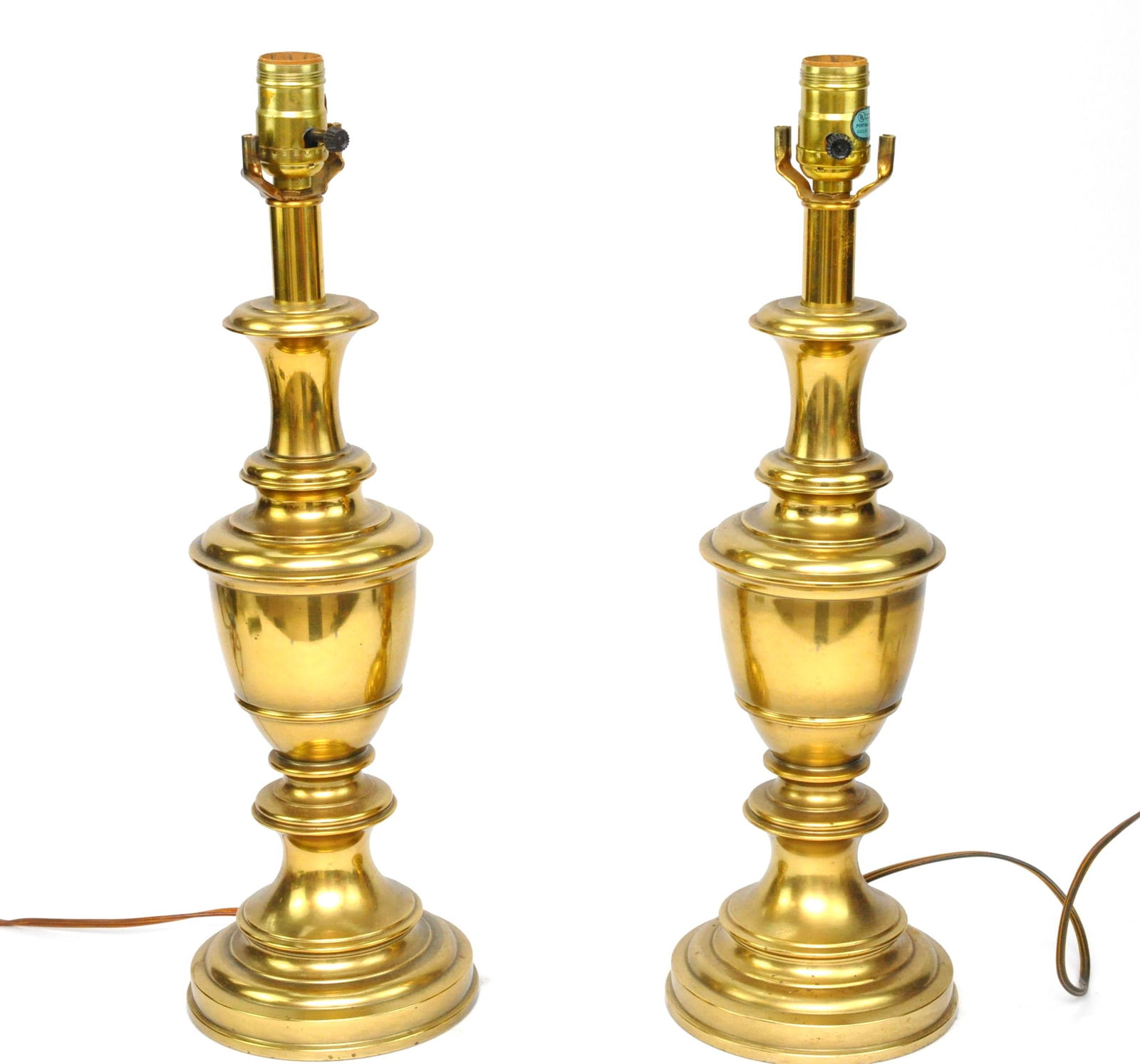 Pair of Brass Lamps: Pair of brass lamps (possibly Stiffel) with single sockets. No harps present, but lamps light. Size: 27"h