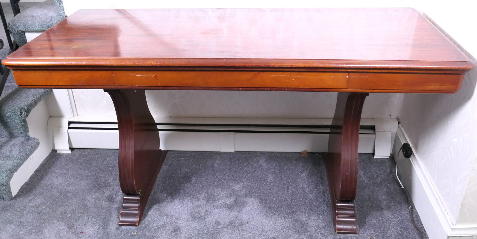 Trestle Style Console Table: Trestle style console or library table with single drawer. Scratches, surface damage, paint streaks. Size: 4'11.5"w x 25.25"d x 29.5"h Location: Hallway