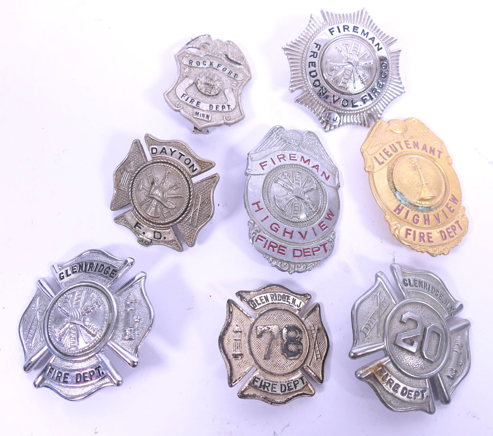 Eight Firefighter Badges (1 of 9)