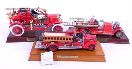 Three Franklin Mint Fire Trucks
