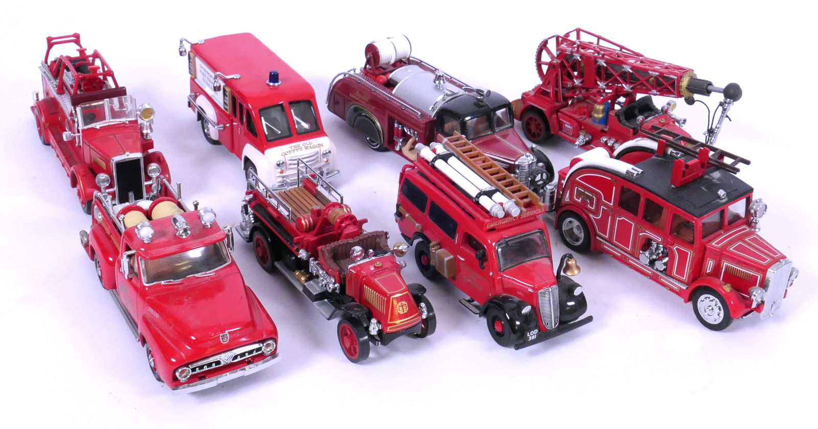 Eight Matchbox Yesteryear Fire Trucks: Eight Matchbox Yesteryear die cast firetrucks including 1939 Bedford Bristol Aeroplane Co, Dodge Routz Van, 1920 Mack AC and more. Size: largest 5.25"L x 1.75"d x 2"h Location: Basement
