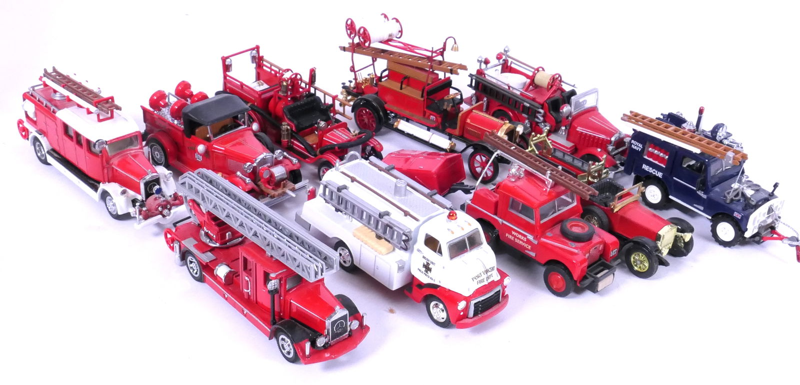 Matchbox Models Of Yesteryear: Matchbox Models of Yesteryear including Mercedes Benz ladder fire truck, 1948 GMC Pumper and more, (10) total. Size: Largest 5"L x 1.75"d x 2"h Location: Basement