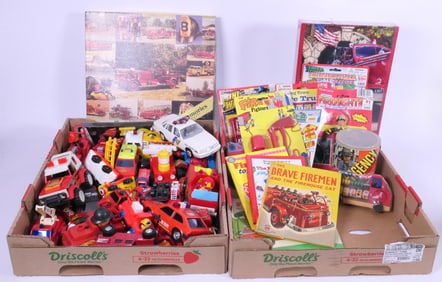 Two Boxes of Fire Truck Toys and Puzzles