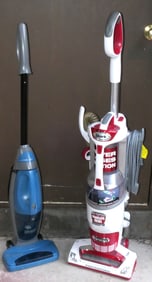 Two Vacuum Cleaners