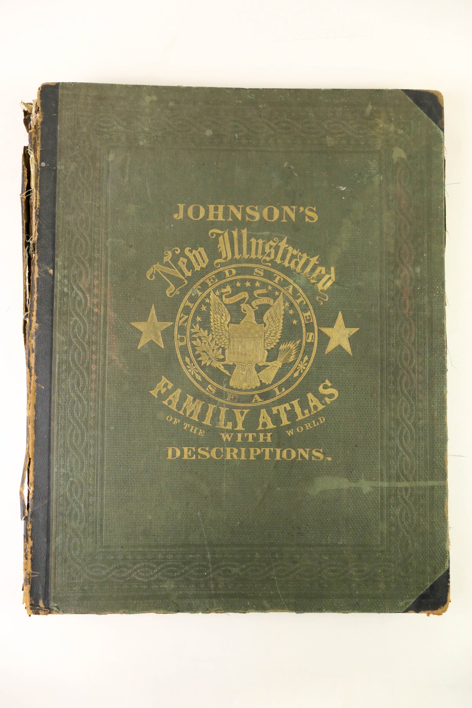 Johnson's Illustrated Family Atlas: Johnson's Illustrated Family Atlas dated 1864. Front cover is broken off. Some browning around corners, pencil writing, and some tears present. Size: 15"w x 18.75"h Location: Den