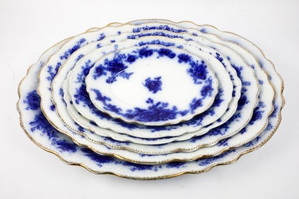 Five Graduated Flow Blue Platters