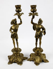 Pair of Footed Heavy Brass Figural Candlesticks