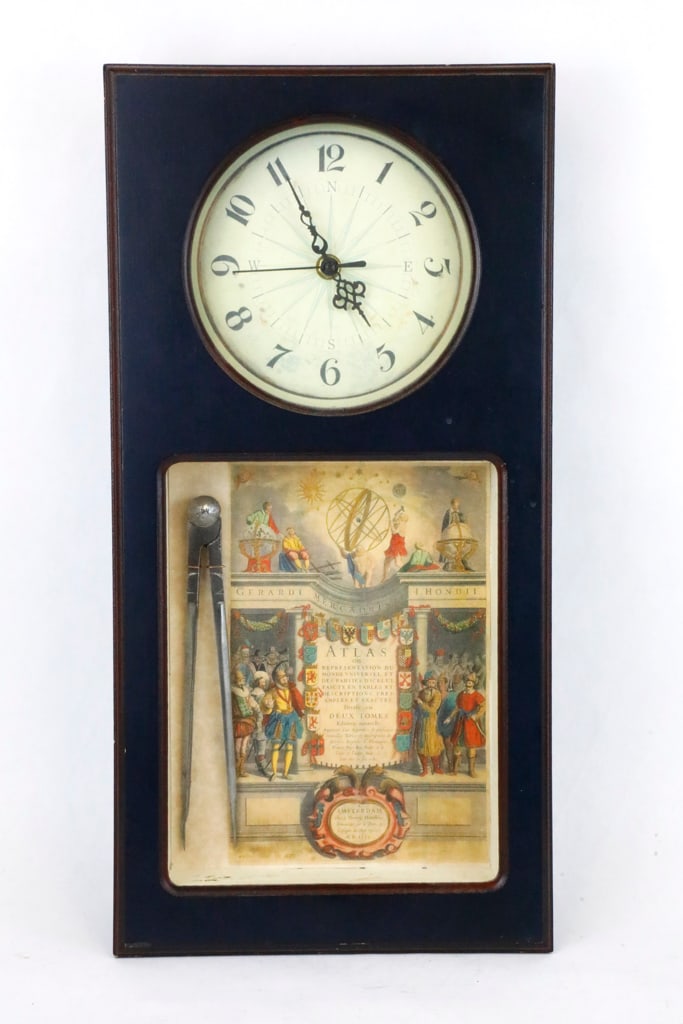 Modern Nautical Theme Wall Clock: Modern nautical theme battery operated wall clock with a compass dial. There is an attached shadowbox with a radius tool and a copy of an older paper in color. Untested. Size: 9.5"w x 2"d x 19.25"h