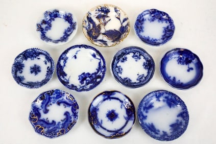 Ten Antique Flow Blue Butter-Pats