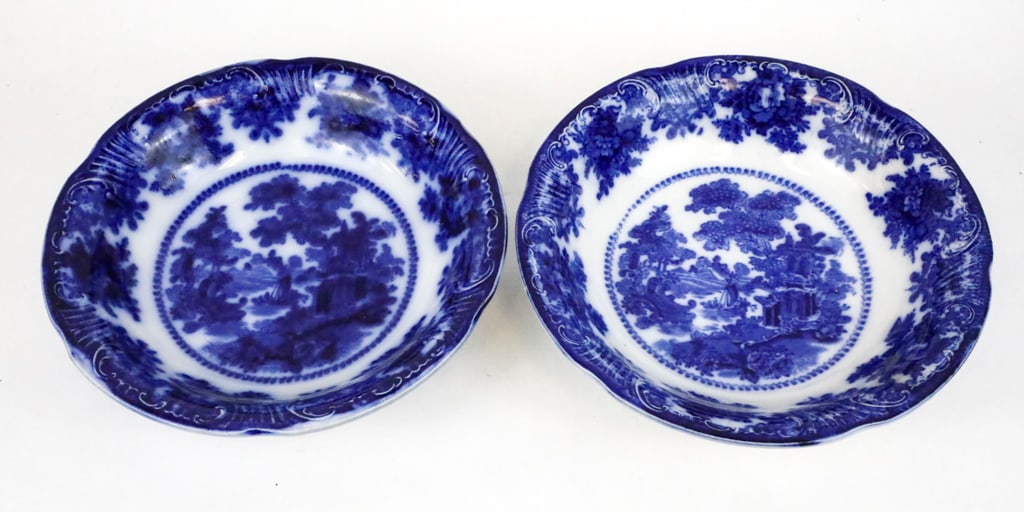 Two Fairy Villas Bowls by William Adam's and Co.: (2) Fairy Villas Bowls by William Adam's and Company, circa late 1800's. The bowls feature a central motif of a riverfront building, a boat, and trees. There is a floral border with textured scroll mo