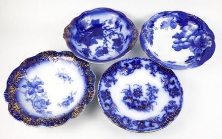 Four Flow Blue Bowls with Gold Tone Accents